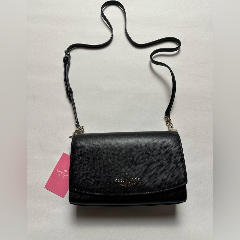 NWT Kate Spade classic black crossbody adjustable strap bag. Flap closure